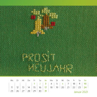 Januar-Kalenderblatt. Grüne Neujahrsgrüße. Handgestickte Neujahrskarte aus den 1950er Jahren. Foto: Oliver Kolken